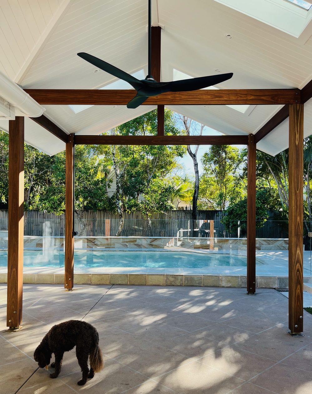 Poolside pergola with pitched roof and skylights